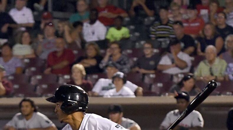 Jose Siri hits an infielder grounder that went for a base hit in the eighth inning Wednesday and extended his Midwest League-record hitting streak to 38 consecutive games.