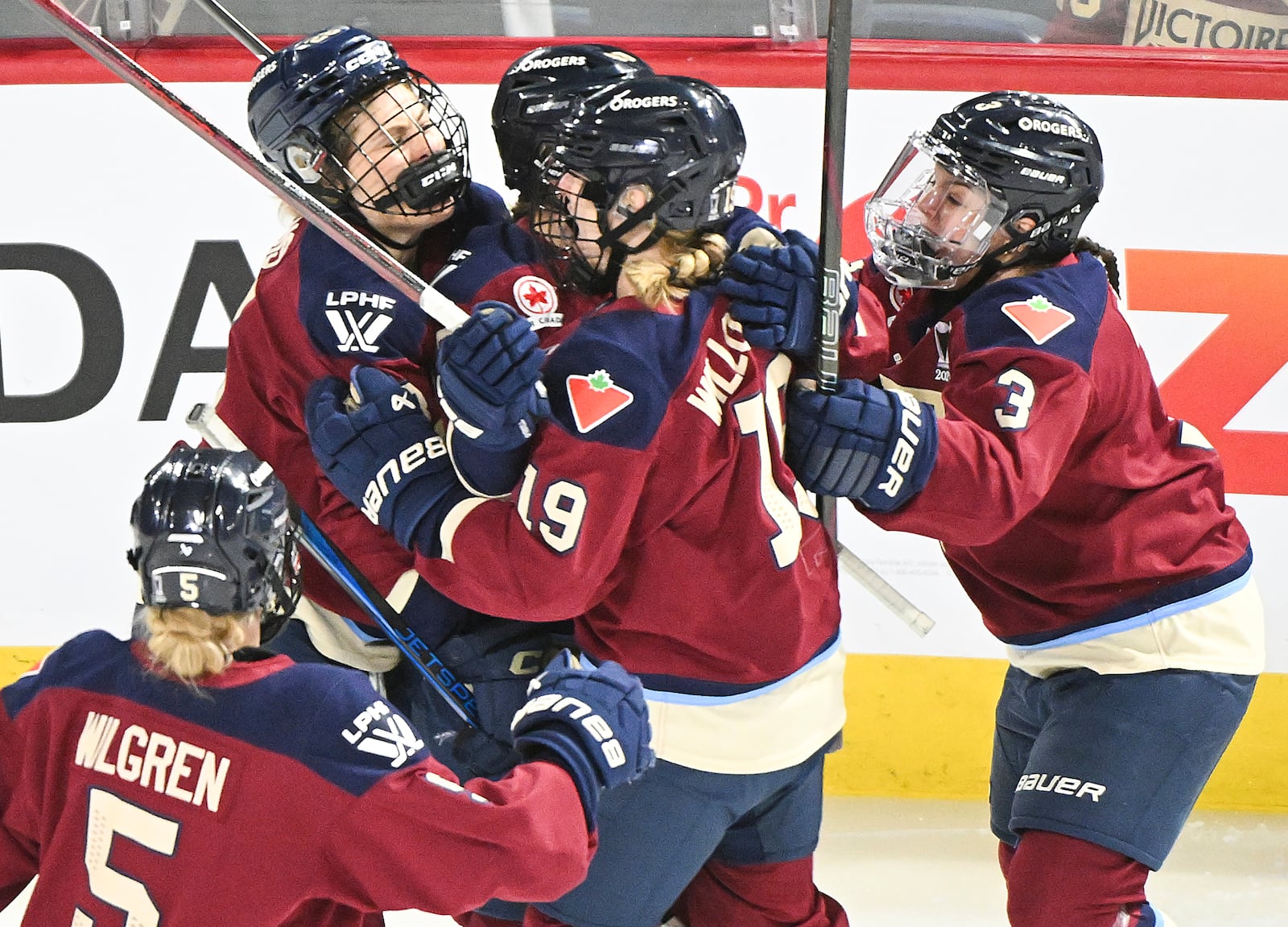 Montreal Victoire's Kristin O'Neill (43) celebrates with teammates after scoring against the Ottawa Charge during first-period PWHL hockey playoff action in Laval, Quebec, Sunday, May 11, 2025. (Graham Hughes/The Canadian Press via AP)