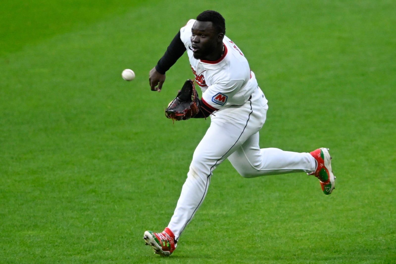 Cleveland Guardians right fielder Jhonkensy Noel makes a running catch against the Boston Red Sox during the fourth inning of the second baseball game of a doubleheader, Saturday, April 26, 2025, in Cleveland, (AP Photo/David Richard)