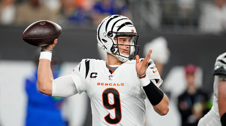 Cincinnati Bengals quarterback Joe Burrow throws during the first half of an NFL football game against the Los Angeles Rams Monday, Sept. 25, 2023, in Cincinnati. (AP Photo/Darron Cummings)