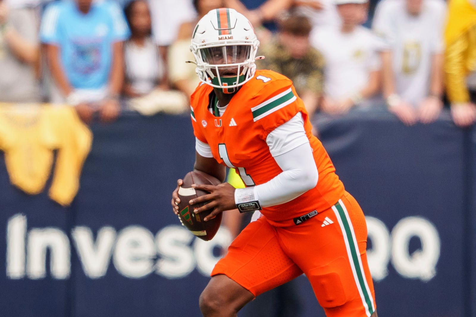 FILE - Miami quarterback Cam Ward (1) looks for an open receiver during the first half of an NCAA college football game against Georgia Tech, Saturday, Nov. 9, 2024, in Atlanta. (AP Photo/Jason Allen, File)