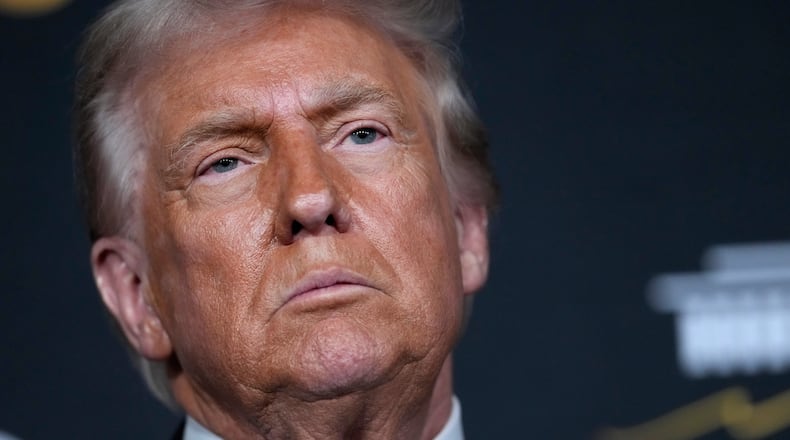 President Donald Trump walks the red carpet before the 48th Kennedy Center Honors, Sunday, Dec. 7, 2025, at the John F. Kennedy Center for the Performing Arts in Washington. (AP Photo/Julia Demaree Nikhinson)