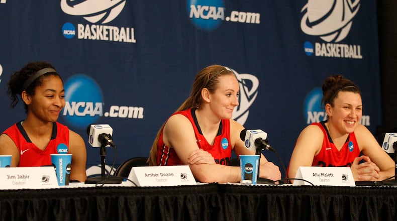 Dayton's Amber Deane, Ally Malott and Andrea Hoover smile during a postgame press conference after a victory against Louisville in the third round of the NCAA tournament on Saturday, March 28, 2015, at the Times Union Center in Albany, N.Y. David Jablonski/Staff