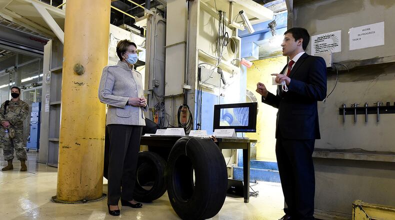Secretary of the Air Force Barbara Barrett is briefed by Sami Labban at the Landing Gear Test Facility, Wright-Patterson Air Force Base, April 21. Engineers at the facility have developed a new, one-of-a-kind test capability that can identify, characterize and classify tire wear under realistic operational conditions – saving thousands per tire over the life cycle. (U.S. Air Force photo/Ty Greenlees)