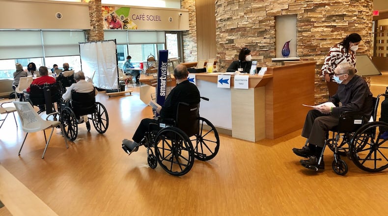 Residents at Community First Solutions' Jamestowne facility line up to receive the Pfizer COVID-19 vaccine on Monday, Dec. 21, 2020. PROVIDED