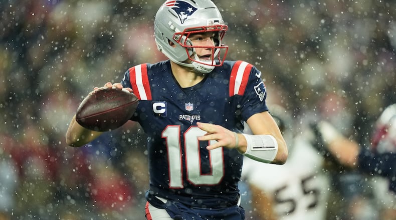 New England Patriots quarterback Drake Maye (10) passes against the Houston Texans during the second half of an NFL divisional playoff football game, Sunday, Jan. 18, 2026, in Foxborough, Mass. (AP Photo/Robert F. Bukaty)