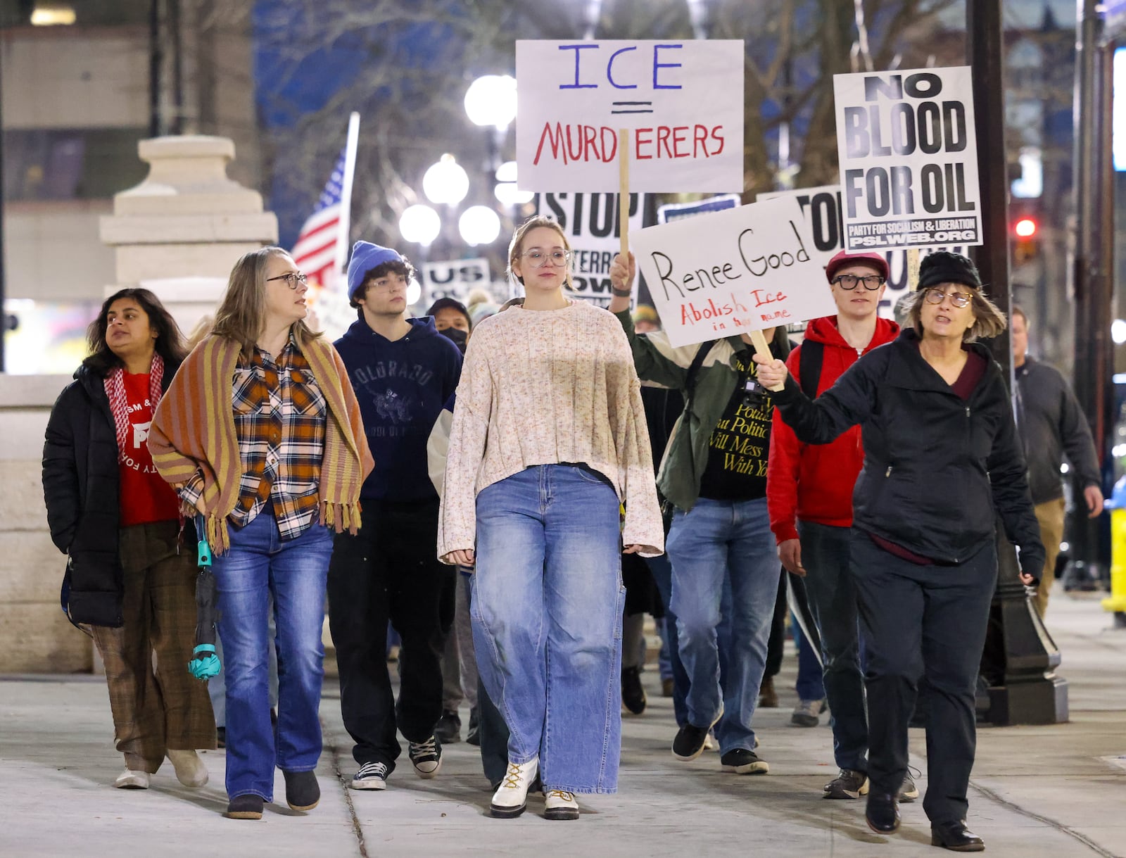 Demonstrators march on West Third Street near Courthouse Square on their way to Walter H. Rice Federal Building on Thursday, Jan. 8 during the Dayton to Minneapolis Stop ICE Terror protest. The protest was organized by a local chapter of the Party for Socialism and Liberation. BRYANT BILLING/STAFF