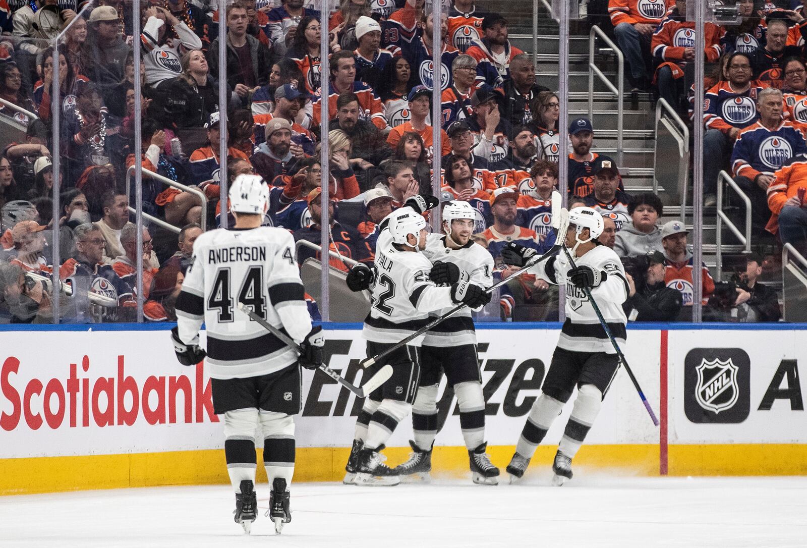 Los Angeles Kings' Mikey Anderson (44), Kevin Fiala (22), Alex Laferriere (14) and Quinton Byfield (55) celebrate a goal against the Edmonton Oilers during the second period of an NHL playoff game in Edmonton on Sunday, April 27, 2025. (Jason Franson/The Canadian Press via AP)