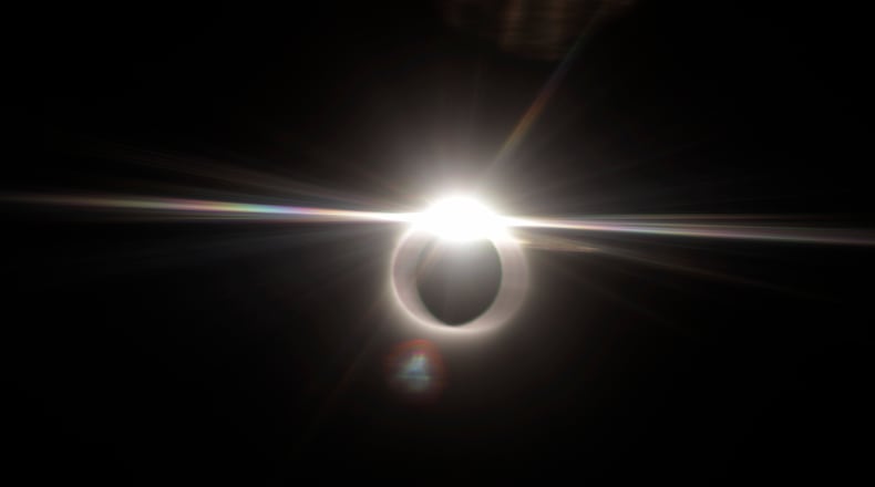 FILE - A total solar eclipse is seen from an aircraft over Patna, India, Wednesday, July 22, 2009. (AP Photo/Shreya Sahai, File)