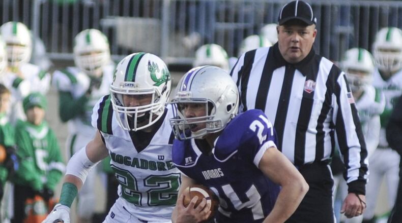 Fort Recovery’s Will Homan (with ball) was the D-VI All-Ohio offensive player of the year. MARC PENDLETON / STAFF