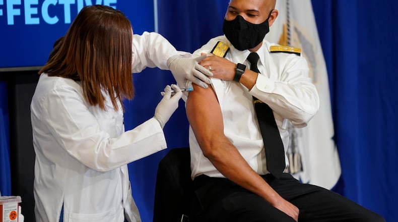 During a joint press conference with Gov. DeWine on Saturday, U.S. Surgeon General Jerome Adams sought to assure the public that both federally approved COVID-19 vaccines are safe and effective. Adams received a vaccine publicly on Friday.