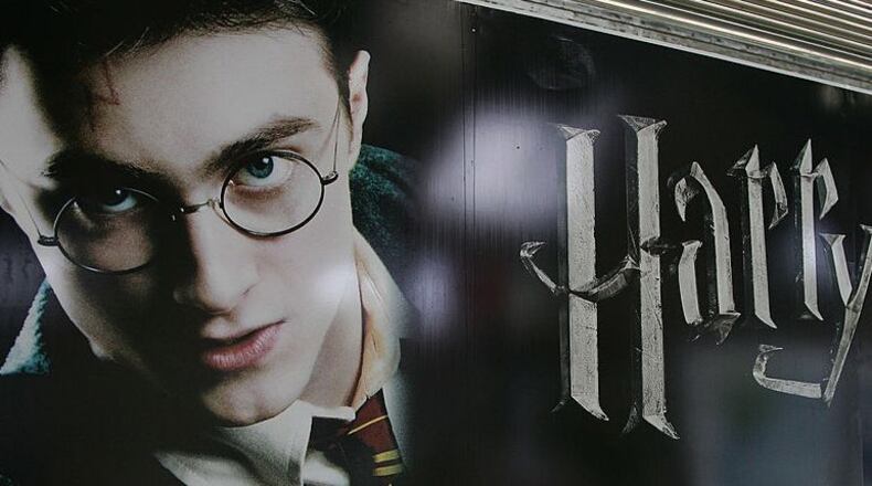 FILE PHOTO: Posters for the " Harry Potter And the Order Of The Phoenix" film. A company is looking for five fans to binge all the films from the "Harry Potter" universe.