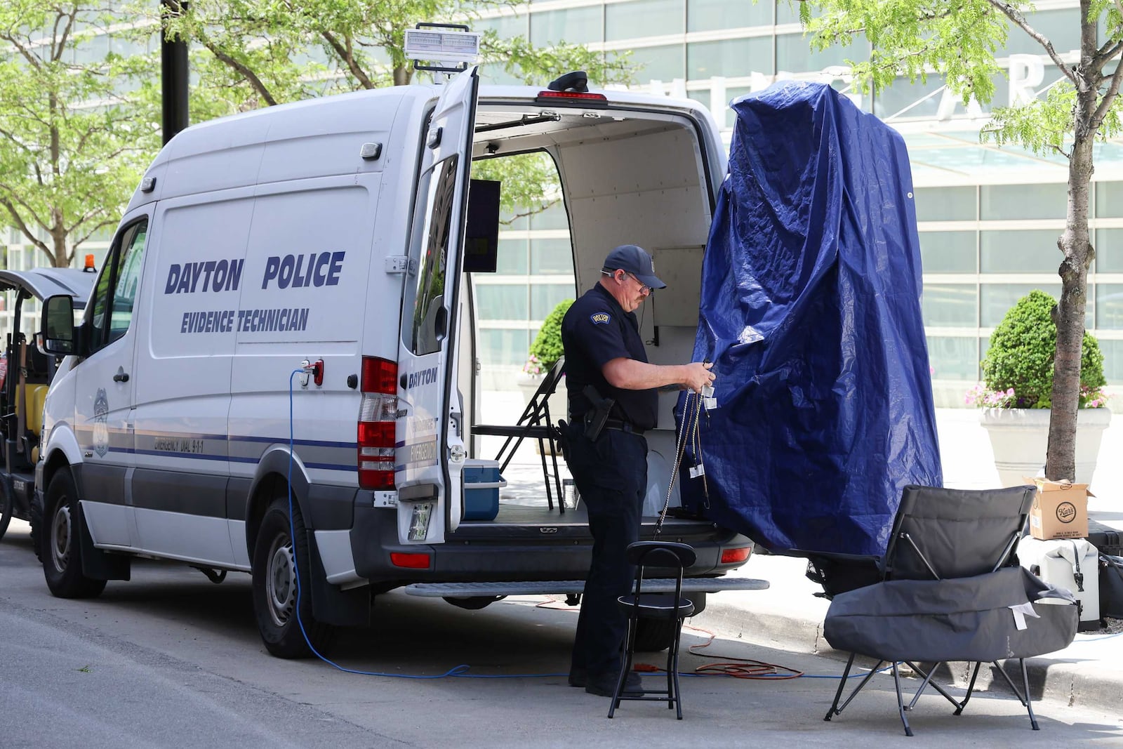 A Dayton police officer packs up drone patrolling equipment following the NATO Parliamentary Assembly Monday, May 26, 2025. BRYANT BILLING / STAFF