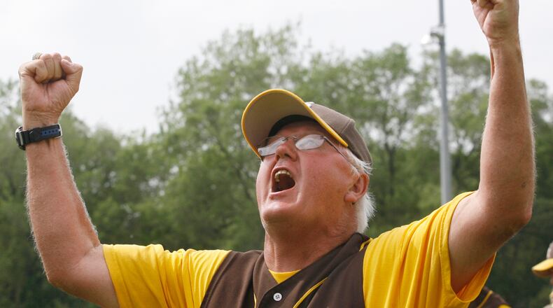 Assistant Kenton Ridge baseball coach Andy Fitzwater reacts to a 17-7 win over Columbus St. Francis DeSales in the Division II regional championship baseball game Friday, May 30, 2008, at Carleton Davidson Stadium.
Staff Photo by Barbara J. Perenic