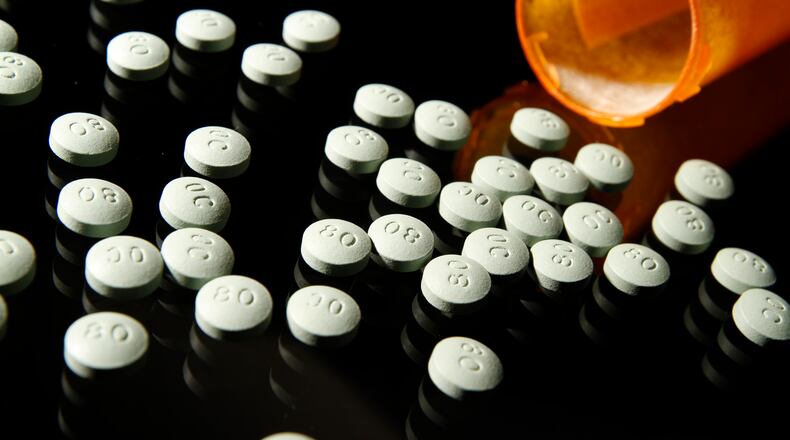 Drugs such as morphine, fentanyl, and oxycodone are such powerful analgesics because they so effectively block pain signals by acting directly on the brain. OxyContin, in 80 mg pills, in a 2013 file image. (Liz O. Baylen/Los Angeles Times/TNS)