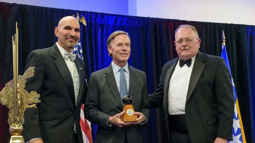Former U.S. Ambassador to China, R. Nicholas Burns, the chief spokesperson for the State Department during 1995’s Dayton Peace Accords receives the Dayton Peace Prize at the Dayton Peace Accords 30th Anniversary Gala and Dayton Peace Prize Ceremony on Saturday, Nov. 15, 2025 at WPAFB’s Hope Hotel. Pictured from left to right: Dayton City Commissioner Matt Joseph, R. Nicholas Burns and U.S. Air Force Lt. Col. (Retired) John McCance, who served as the public affairs officer assigned to be the liaison to State Department Spokesman Burns during the negotiations. TOM GILLIAM/CONTRIBUTING PHOTOGRAPHER