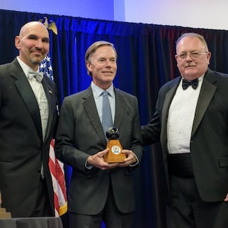 Former U.S. Ambassador to China, R. Nicholas Burns, the chief spokesperson for the State Department during 1995’s Dayton Peace Accords, receives the Dayton Peace Prize at the Dayton Peace Accords 30th Anniversary Gala and Dayton Peace Prize Ceremony on Saturday, Nov. 15, 2025 at WPAFB’s Hope Hotel. Pictured from left to right: Dayton City Commissioner Matt Joseph, R. Nicholas Burns and U.S. Air Force Lt. Col. (Retired) John McCance, who served as the public affairs officer assigned to be the liaison to State Department Spokesman Burns during the negotiations. TOM GILLIAM/CONTRIBUTING PHOTOGRAPHER