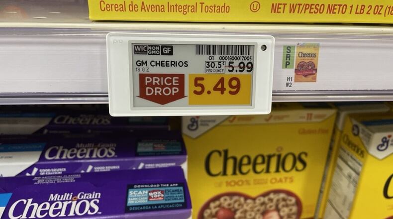 Kroger's new digital tags feature small, white electronic signboards positioned under each item, creating what appears to be a cleaner look in store aisles. WCPO/CONTRIBUTED