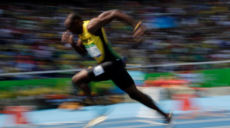 Jamaica's Usain Bolt competes in a men's 200-meter heat during the athletics competitions of the 2016 Summer Olympics at the Olympic stadium in Rio de Janeiro, Brazil, Tuesday, Aug. 16, 2016. (AP Photo/Charlie Riedel)