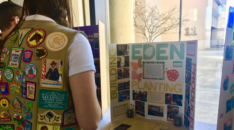 Local Girl Scouts look over the projects that won Gold Awards this year, the top honor for high school Girl Scouts. 21 Dayton-area Girl Scouts received the award this year and were honored at a ceremony at Sinclair Community College Sunday, March 4, 2018.