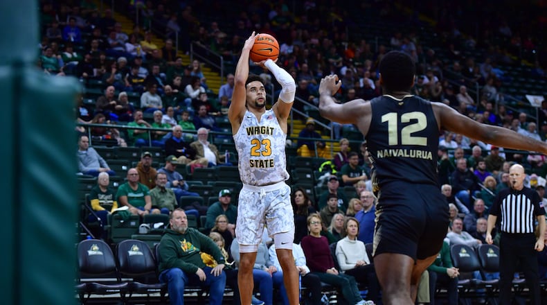 Wright State's Tanner Hudson shoots over Oakland's Tuburu Naivalurua during a game at the Nutter Center on Feb. 10, 2024. Joe Craven/Wright State Athletics