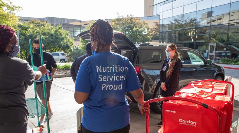 Sister to Sister with sponsors AT&T and CareSource donated lunch to approximately 200 environmental services and nutrition services employees at Miami Valley Hospital on Saturday.