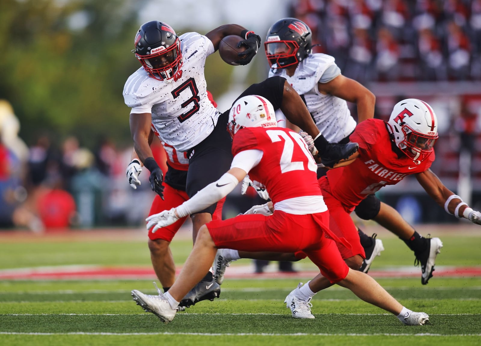 Lakota West's Kenyon Norman carries the ball during their football game against Fairfield Friday, Sept. 19, 2025 in Fairfield. The Indians won 10-7. NICK GRAHAM/STAFF