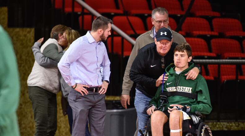 Ryan Custer, the Wright State University basketball player injured after diving into a makeshift pool while at a party in Oxford, returns to Oxford as Wright State plays Miami University Tuesday, Nov. 14. The Miami University Redhawks basketball team defeated the Wright State Raiders 73-67 in overtime Tuesday, Nov. 14 at Millett Hall on the campus of Miami University in Oxford. NICK GRAHAM/STAFF
