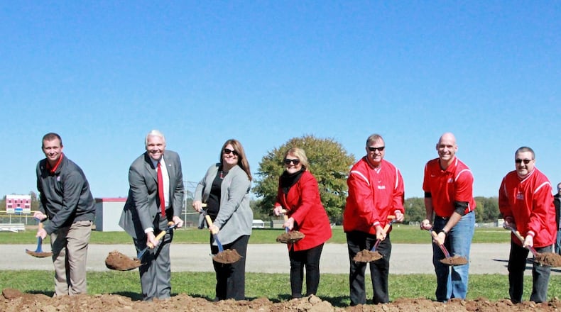Members of the Carlisle Board of Education were on hand to turn some dirt Tuesday, Oct. 23, 2018, during the ground breaking ceremony. From left are: Treasurer Dan Bassler, Superintendent Larry Hook, Board Members Mollie McIntosh,Tammy Lainhart, Bill Jewell, Dale More and Bryan Dunkman. The new $49 million school building that will house students in grades pre-school, through grade 12 as well as the school district offices. The building is expected to open in the fall of 2020. CONTRIBUTED