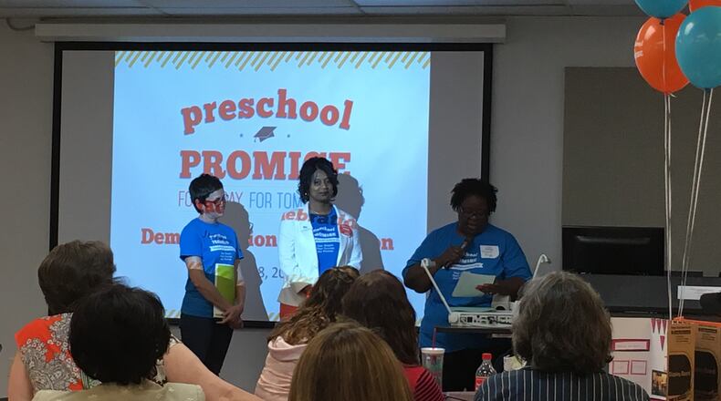 Preschool teacher Vanessa Roy (right) talks about her work with Northern Hills Child Care owner Mary Kay Watkins (left) and Preschool Promise coach Sandra Raye-Redmond to improve her teaching. Teachers, school directors, donors and others gathered at the Miami Valley Regional Center in Riverside on June 8, 2017 to celebrate the end of Preschool Promise’s 2016-17 Demonstration year. JEREMY P. KELLEY / STAFF