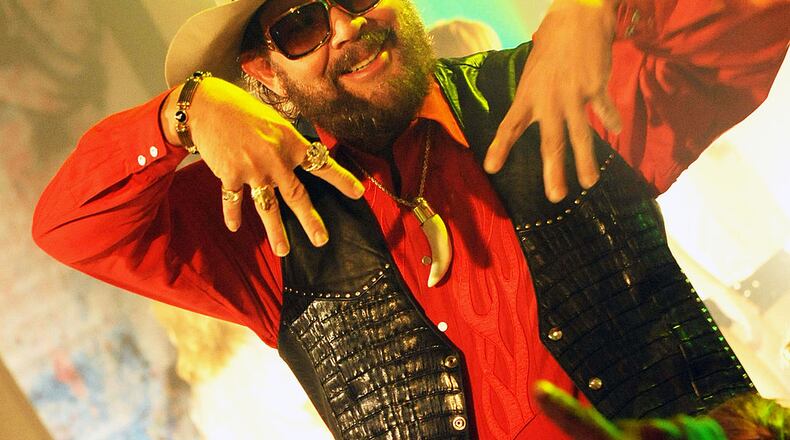 NASHVILLE, TN - JUNE 22: Hank Williams Jr. chats with extras during a break from taping the opening of the 40th Anniversary of Monday Night Football at Centennial Park in the Parthenon on June 22, 2009 in Nashville, Tennessee. (Photo by Rick Diamond/Getty Images)