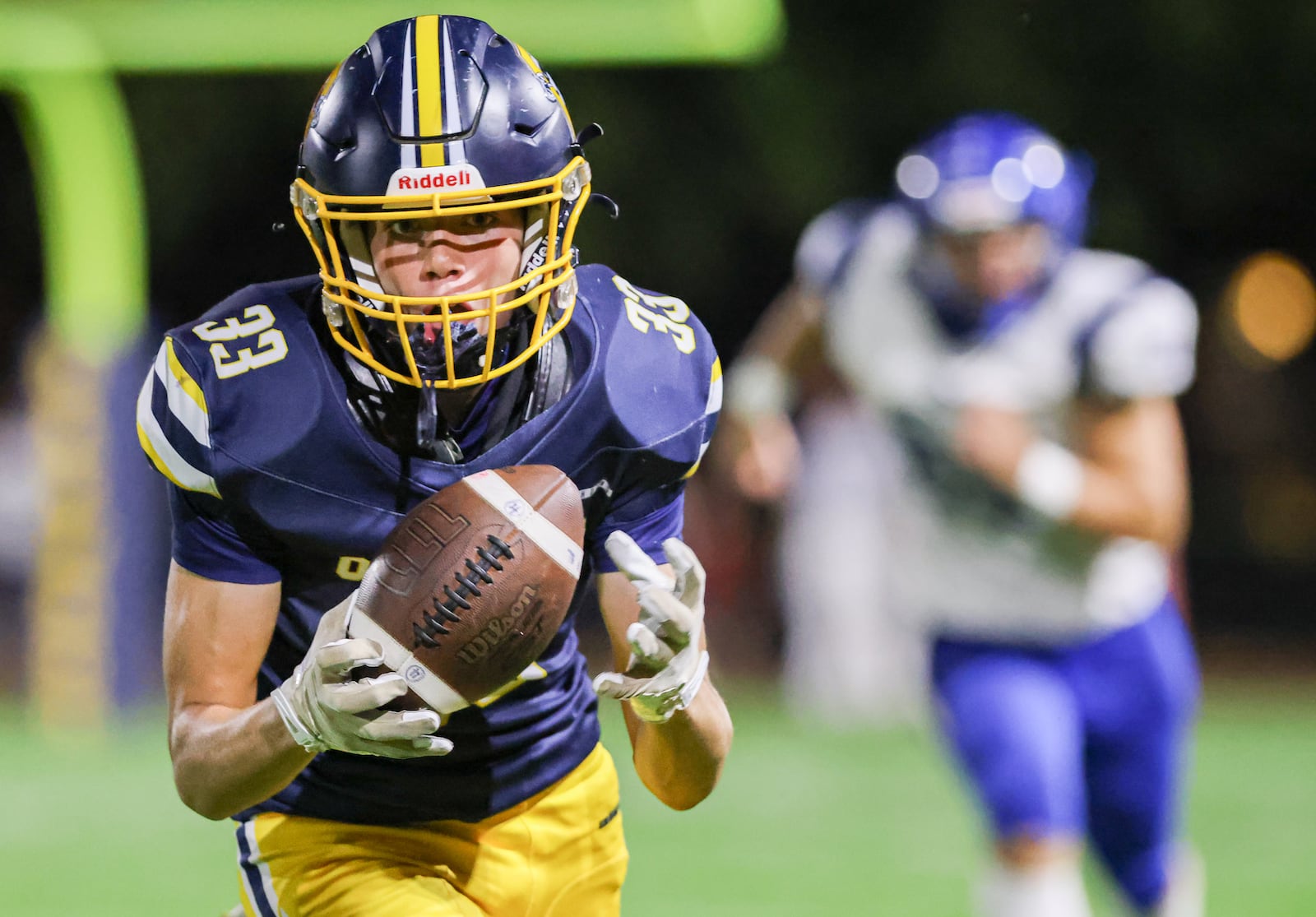 Oakwood freshman receiver Andrew Woeste catches a pass during a Southwestern Buckeye League game on Friday, Oct. 3  at Mack Hummon Stadium. BRYANT BILLING / STAFF