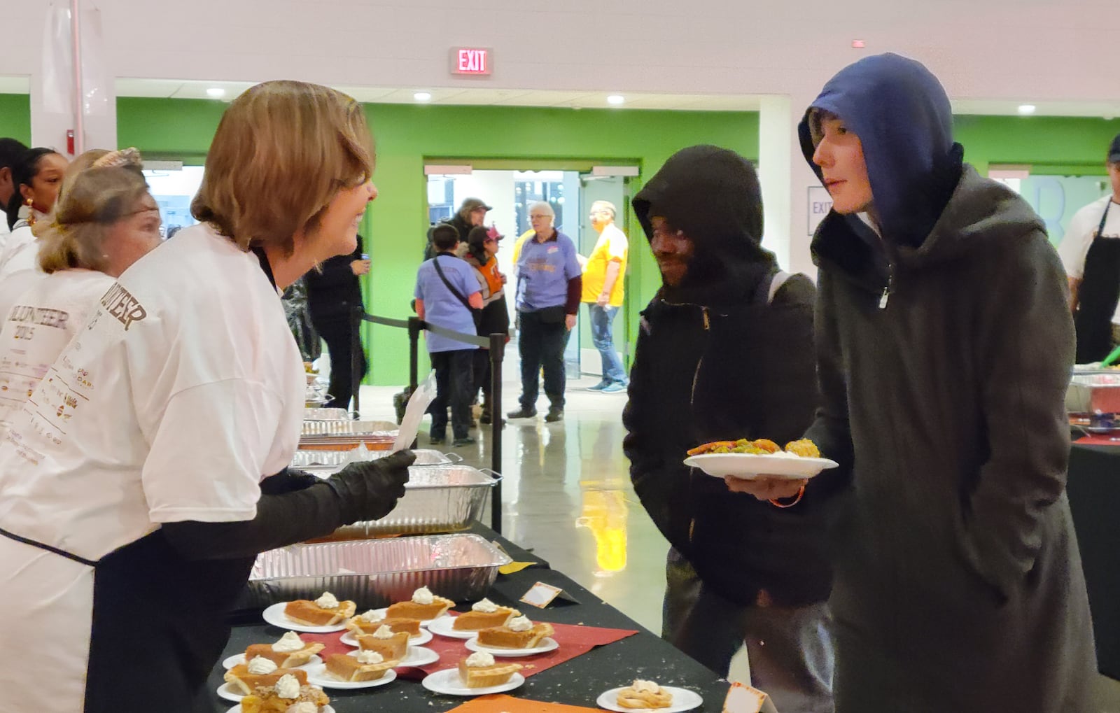 About 300 volunteers helped make and serve food at the 2025 Dayton Feast of Giving on Thanksgiving Day, November 27, 2025. LONDON BISHOP/STAFF