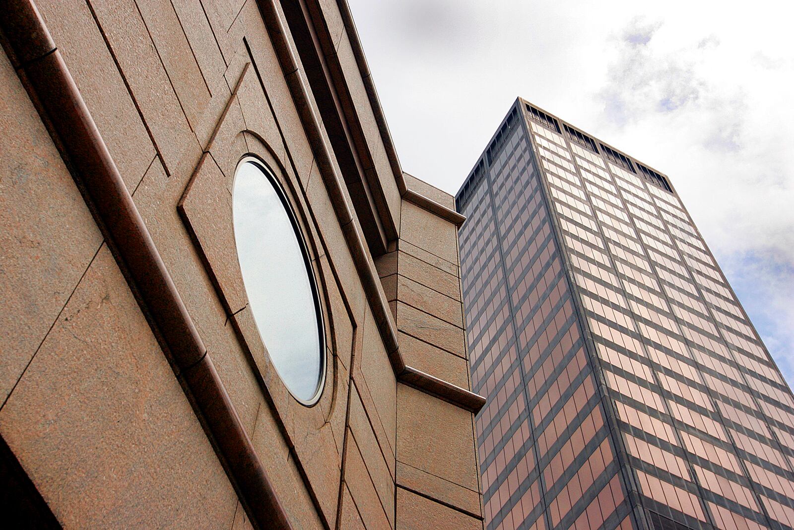 The building at 110 N. Main St. (foreground) and the Kettering Tower (background) both have court-appointed receivers operating them. Staff photo by Jim Witmer