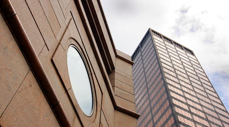 The building at 110 N. Main St. (foreground) and the Kettering Tower (background) both have court-appointed receivers operating them. Staff photo by Jim Witmer
