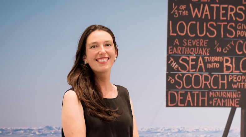Katherine Ryckman Siegwarth is pictured at the opening reception of the FotoFocus curated exhibition, On the LIne: Documents of Risk and Faith, at the Contemporary Arts Center in Cincinnati. A former curator at the Dayton Art Institute, she is currently director of the FotoFocus Biennial. JACOB DRABIK/PHOTOGRAPHER