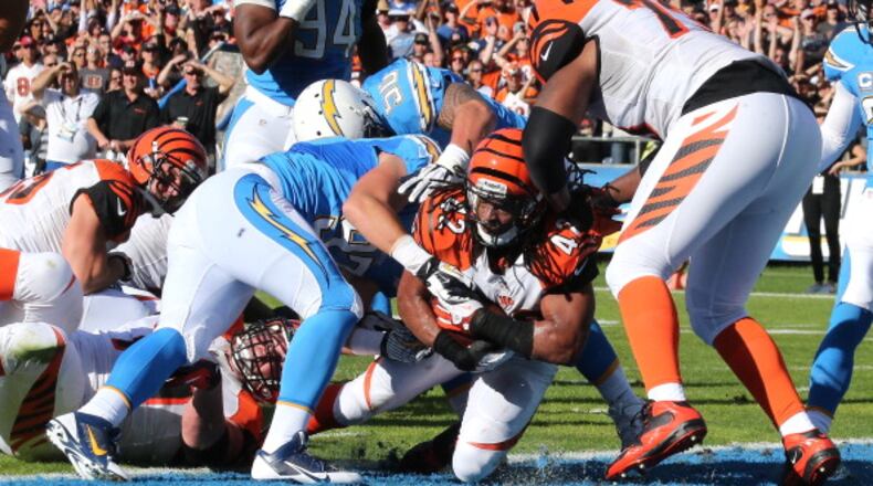 SAN DIEGO, CA - DECEMBER 01: Running back Benjarvis Green-Ellis #42 of the Cincinnati Bengals scores on a four yard touchdown carry against the San Diego Chargers at Qualcomm Stadium on December 1, 2013 in San Diego, California. (Photo by Stephen Dunn/Getty Images)