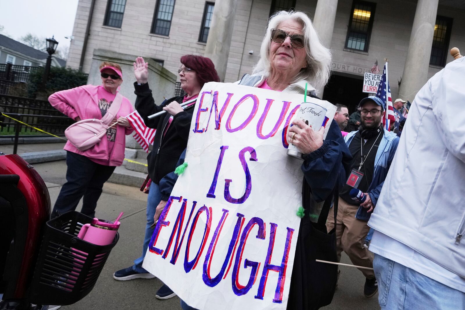Supporters of Karen Read gather on the steps at Norfolk Superior Court prior to Read's trial, Tuesday, April 22, 2025, in Dedham, Mass. (AP Photo/Charles Krupa)