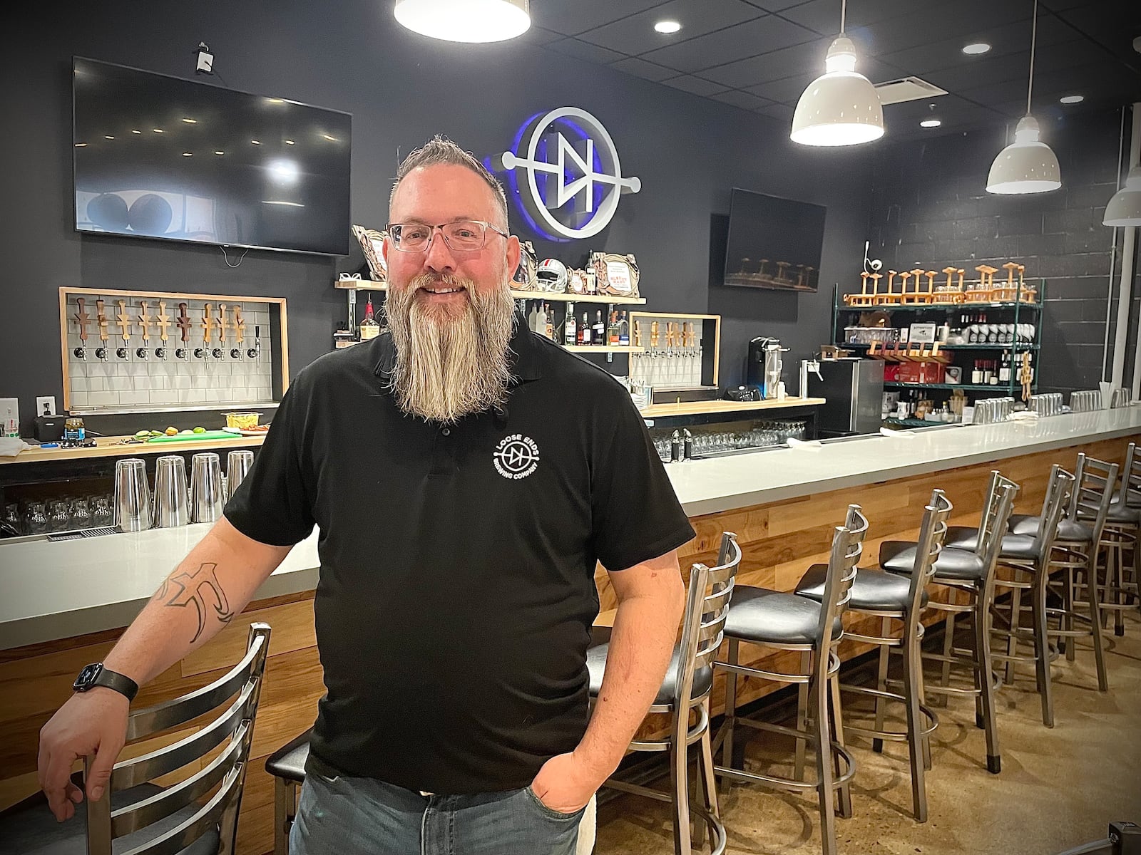 Loose Ends Brewing Company is located at 890 S. Main St. in Centerville. Pictured is Bar Manager Ryan Kubichek. NATALIE JONES/STAFF