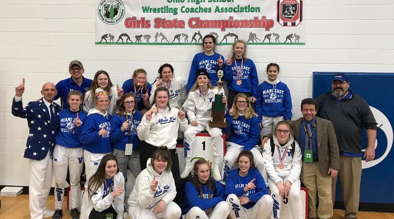 The Miami East High School girls wrestling team won the inaugural Ohio High School Wrestling Coaches Association state championship Sunday at Hilliard Davidson High School. Contributed