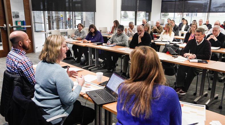 A tornado repair and rebuilding task force meeting drew about 50 officials from storm-hit jurisdictions, nonprofits, public health and utilities suppliers. The effort is to make sure repair projects aren’t mired in red tape when skilled volunteers arrive in the spring. CHRIS STEWART / STAFF