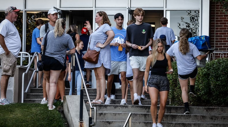 In this photo from last year, the University of Dayton held the freshmen "move in day" at the university Friday, August 19, 2022. Hundreds of student filled the walkways and steps moving their items in their dorm rooms. JIM NOELKER/STAFF