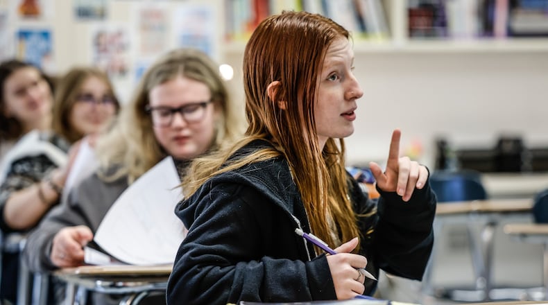 Springboro High School senior, Bailey Wallace, right, answers a question in senior English class Thursday September 15, 2022. Springboro schools scored five stars for achievement on state tests. JIM NOELKER/STAFF