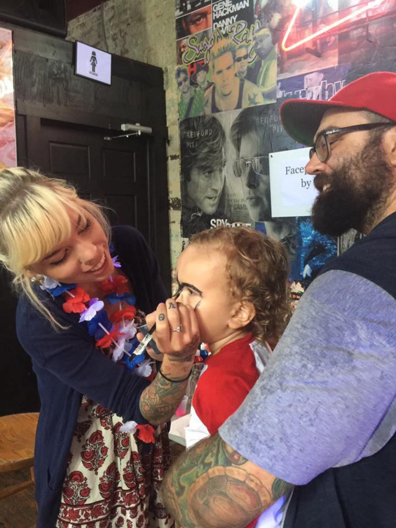 Oregon District and downtown business are planning events to remember  Felicia “Fe Meier”Listermann and support her family. Listermann died February 14 in Dayton.  Listermann (left ) is pictured with Nick and Harvey Testa.