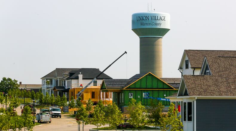 Warren County’s Union Village, located on Ohio 741 west of Lebanon in Turtlecreek Twp., is under way with more homes being built. The 1,230-acre master planned community is based on new urbanism which includes principles such as walkability, sustainability and quality of life and will be showcased Oct. 1-17 when Union Village hosts the 2021 Home Builders Association of Dayton Homearama. GREG LYNCH / STAFF