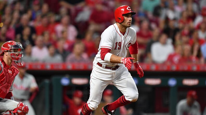 CINCINNATI, OH - JULY 28: Joey Votto #19 of the Cincinnati Reds hits an RBI single in the sixth inning against the Philadelphia Phillies at Great American Ball Park on July 28, 2018 in Cincinnati, Ohio. Cincinnati defeated Philadelphia 6-2. (Photo by Jamie Sabau/Getty Images)