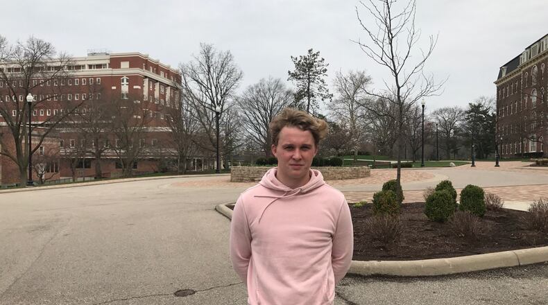 Jonas Fjeldberg, the Atlantic 10 Offensive Player of Year and UD s MVP this past season who is from Jessheim, Norway, stands on the deserted University of Dayton campus Saturday afternoon. Tom Archdeacon/STAFF