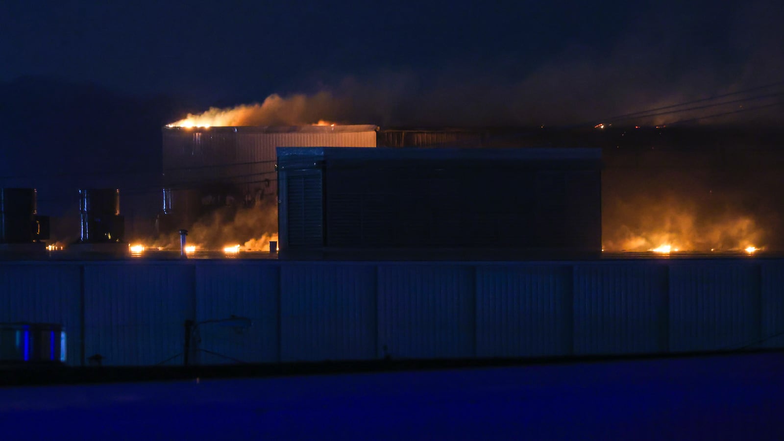 Area firefighters worked to pour water on flames at the Fuyao Glass America plant fire Sunday, March 22, 2026 in Moraine. Bryant Billing / Staff