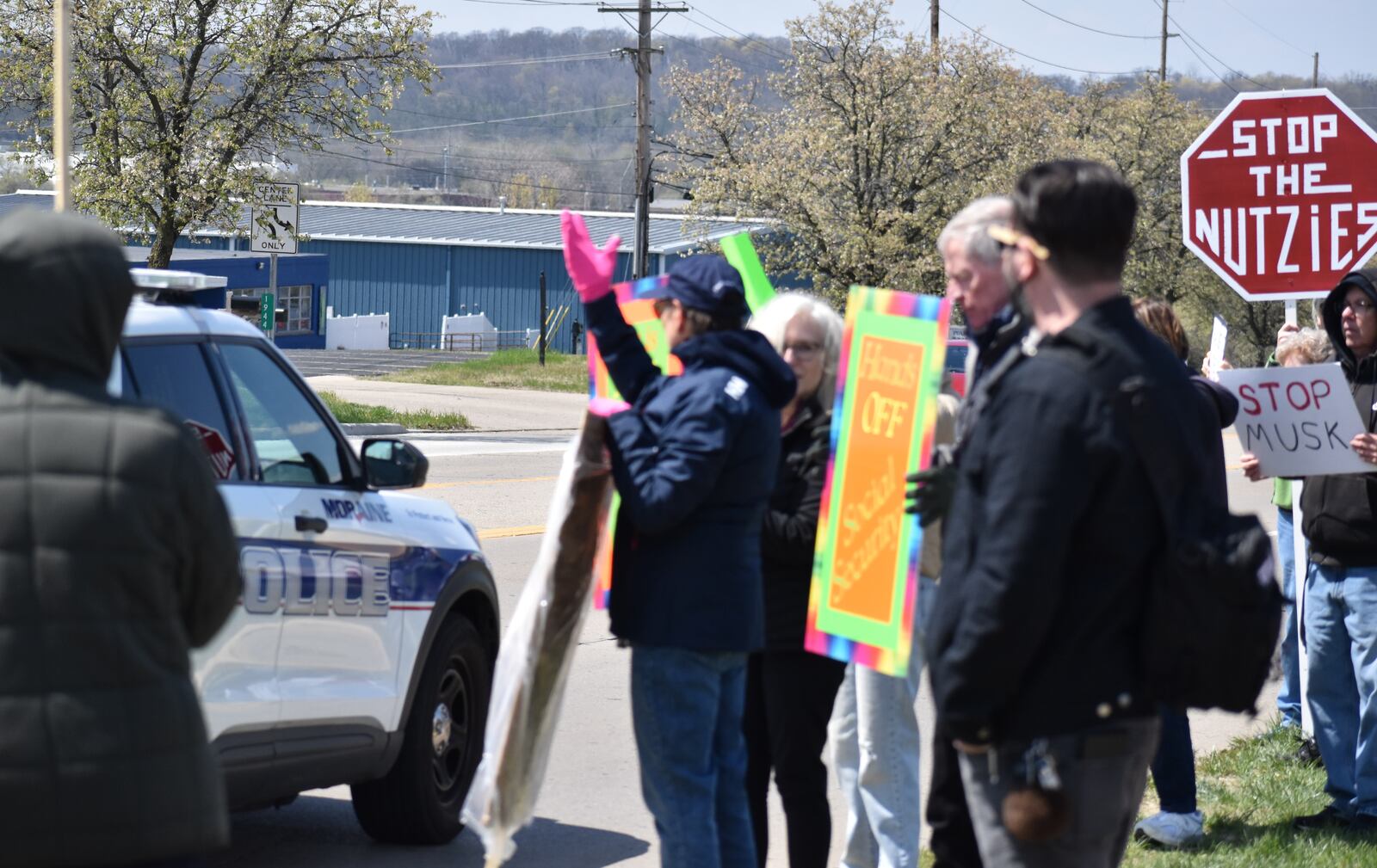 Anti-Musk protests continued on Saturday, April 12, 2025, at a Tesla facility in Moraine. People are the protest said veterans, Social Security, Medicare, Medicaid and other social services were at the top of their concerns. SAM WILDOW/STAFF