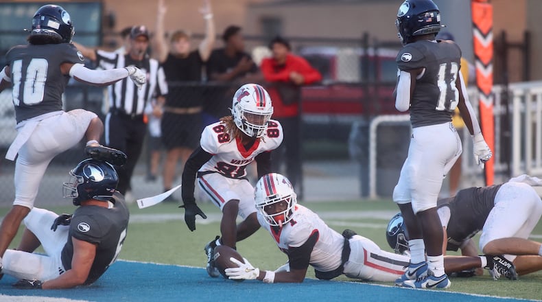 Wayne's Jamier Averette-Brown comes up short of the goal line after a catch against Fairmont in the third quarter on Friday, Sept. 19, 2025, at Roush Stadium in Kettering. David Jablonski/Staff